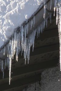 ice dam hanging from gutters